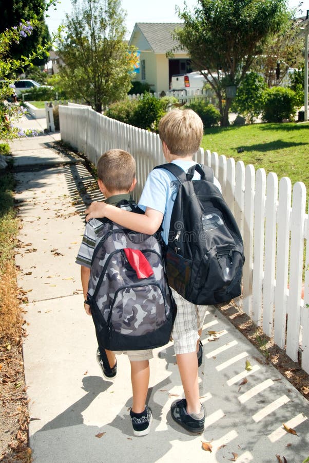 Brothers walking home from school