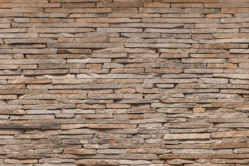 Brown Beige Stone Tile Abstract Pattern Wall Texture Background Solid royalty free stock photo