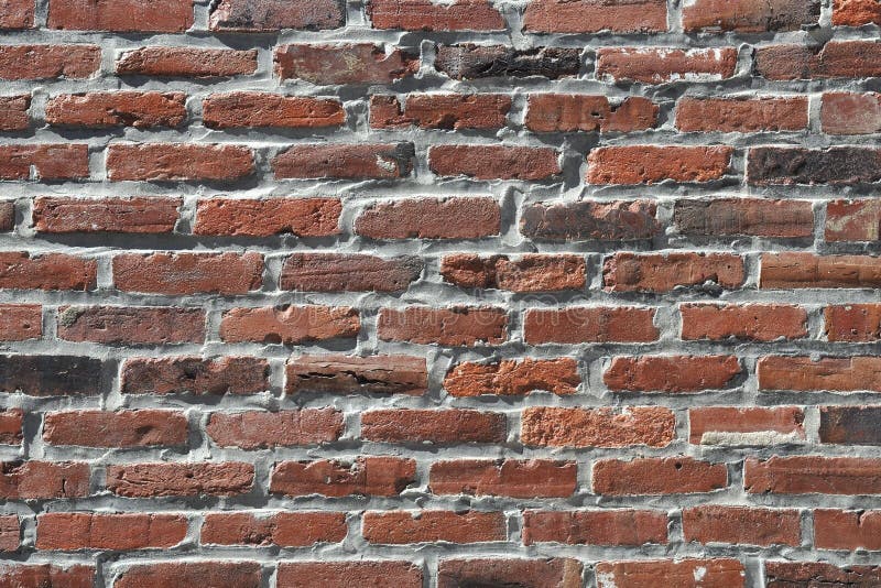 Brown black gray old brick wall royalty free stock image