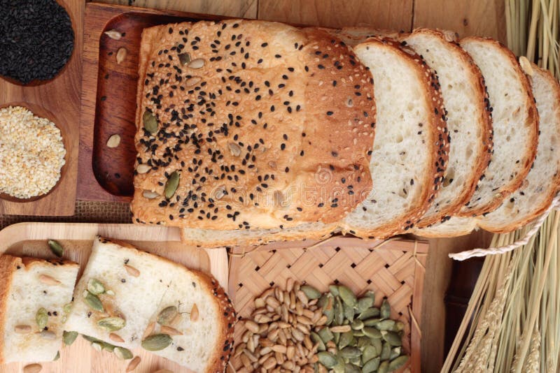 Brown Bread with Whole Grain Cereals of Sliced and Milk. Stock Image