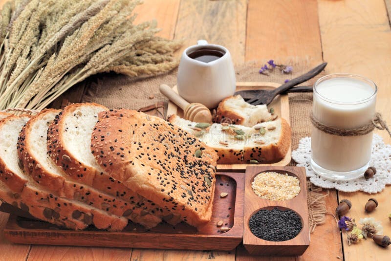 Brown Bread with Whole Grain Cereals of Sliced and Milk. Stock Image