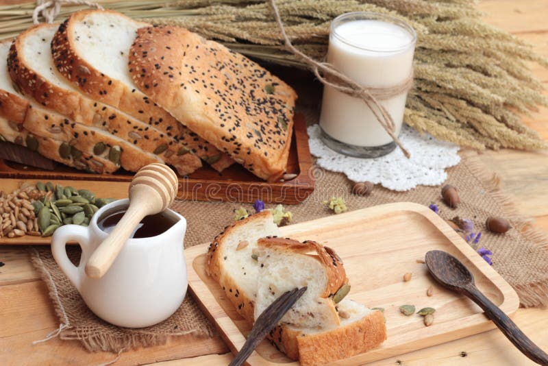 Brown Bread with Whole Grain Cereals of Sliced and Milk. Stock Image