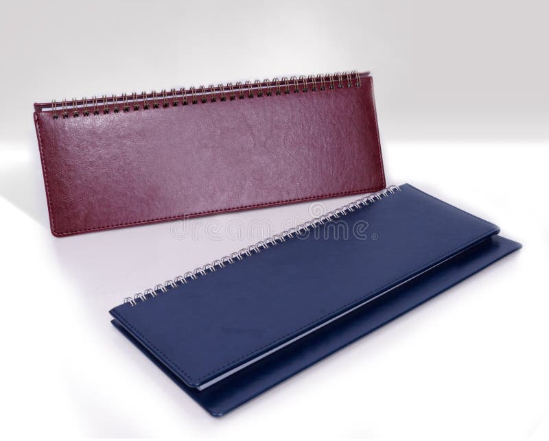 Brown and dark blueAn open notebook in leather binding Spiral made of leather. royalty free stock images