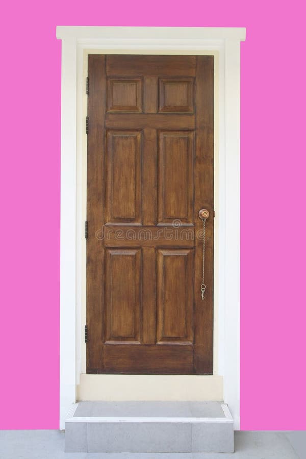 Brown door with pink wall