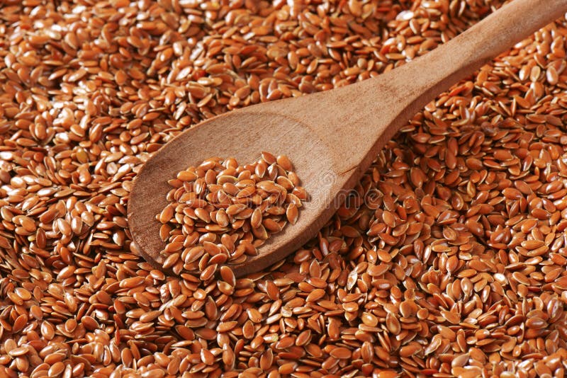 Brown flax seeds background