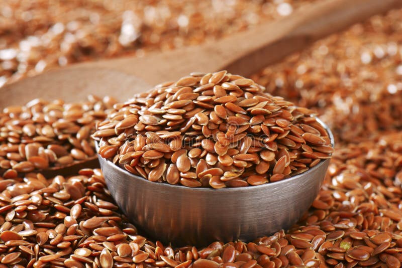 Brown flax seeds background