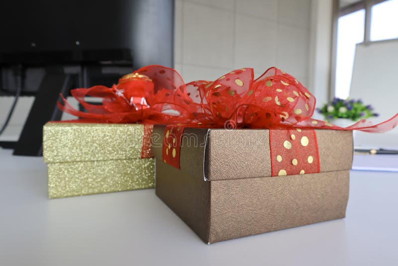Two gift boexes on the white desk royalty free stock photography Two gift boexes on the white desk royalty free stock photography