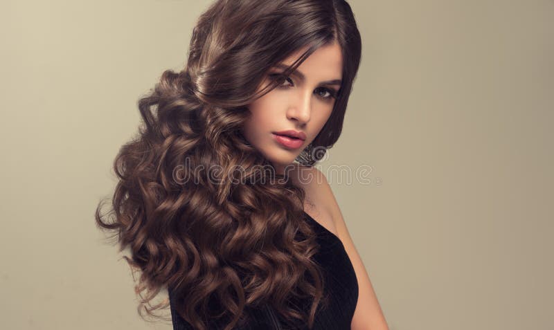 Brown Haired Woman With Voluminous Shiny And Curly Hairstyle Frizzy