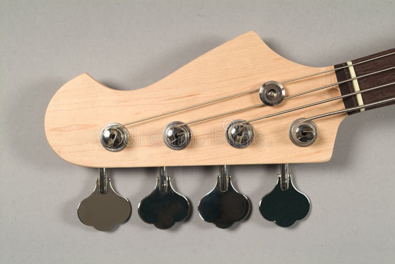 Brown Headstock Bass Guitar Stock Photo Image of object, people 13271314