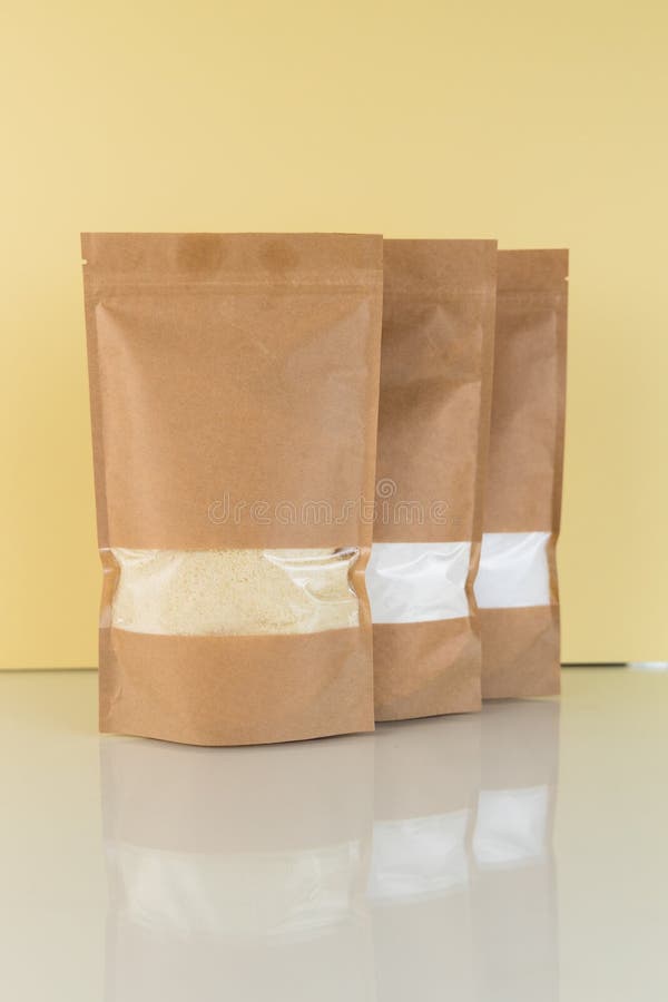 Download Brown Kraft Paper Doypack Bags With Groceries Front View On A Yellow Background Packaging For Foods And Goods Template Mock Up Stock Photo Image Of Nutrition Caffeine 174689356 Yellowimages Mockups