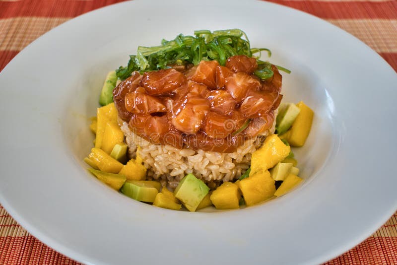 Brown Rice Salad with Tuna, Mango, Avocado and Seaweed Stock Image