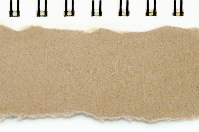 Brown ripped paper on book white paper color background, have copy space for put text royalty free stock images Brown ripped paper on book white paper color background, have copy space for put text royalty free stock images