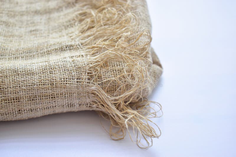 Brown sackcloth texture background, folded burlap fabric textile for design royalty free stock photography