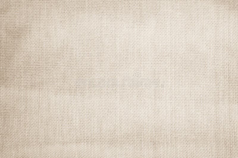 Brown sackcloth woven texture background in natural pattern. Jute hessian burlap, linen background in light beige cream color stock photos