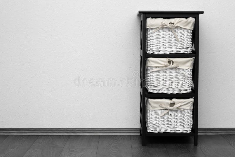 Brown shelf with wicker baskets