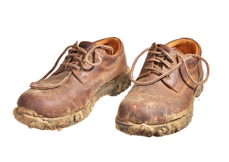 Very muddy Brown shoes, isolated on white