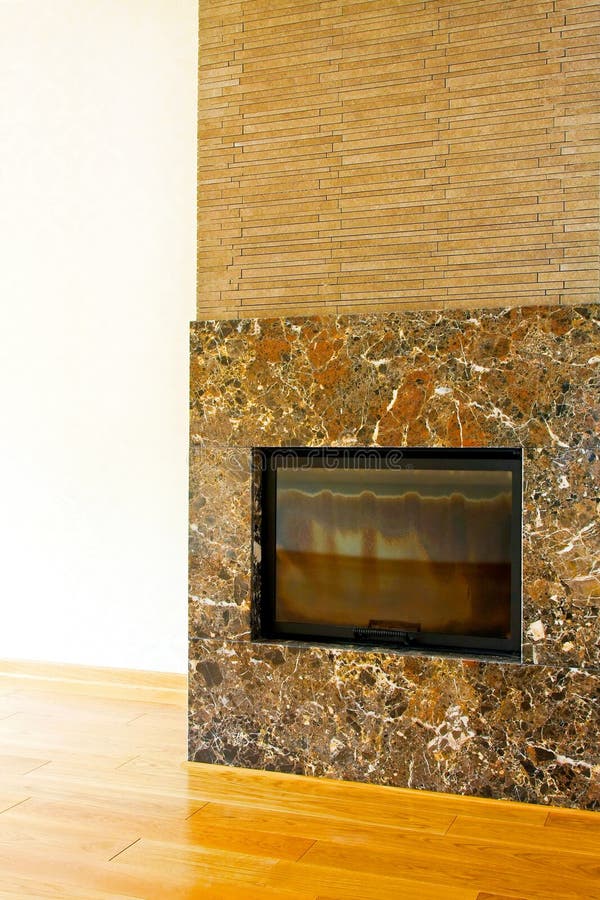 Brown stone fireplace royalty free stock photos