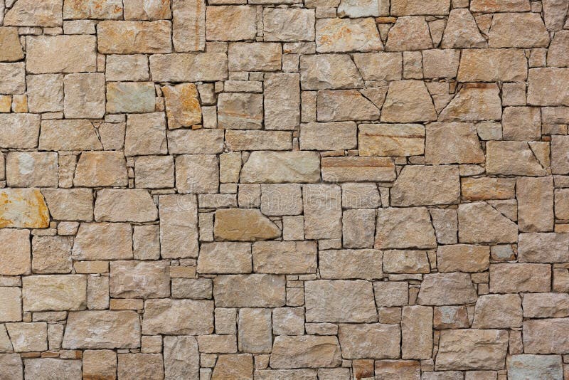 Brown stone slabs, wall texture royalty free stock image