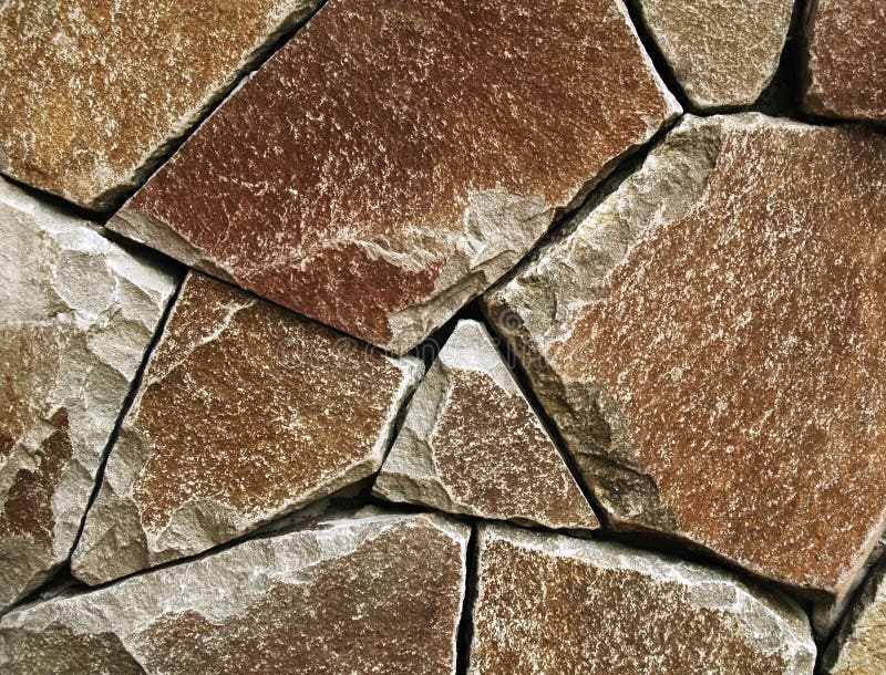Brown stone wall background royalty free stock photos