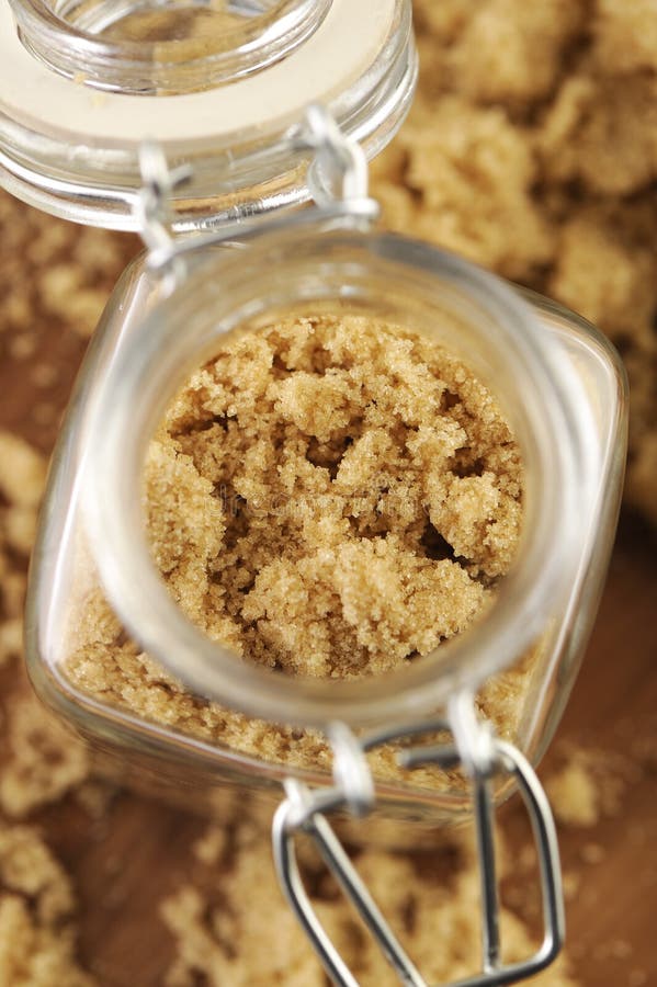 Brown sugar in a small jar view from above.