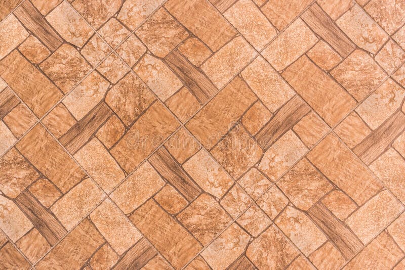 Brown tile floor with abstract pattern of stone texture background, top view stock images