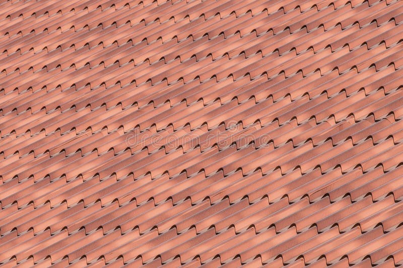 Brown tile metal tiles roof surface house pattern texture home background stock photo