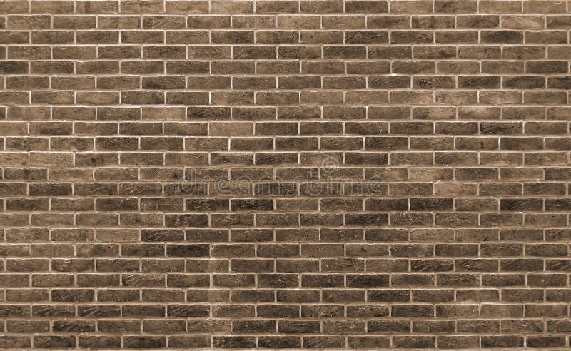 Brown toned brick wall with repeating pattern