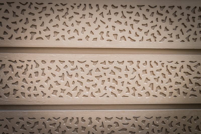 Brown Wood Carving Pattern on Wall with Horizontal View Stock Photo