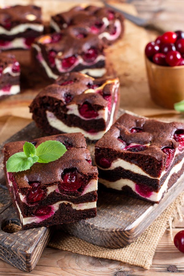 Brownie with Cottage Cheese and Cherries on Wooden Table Stock Photo