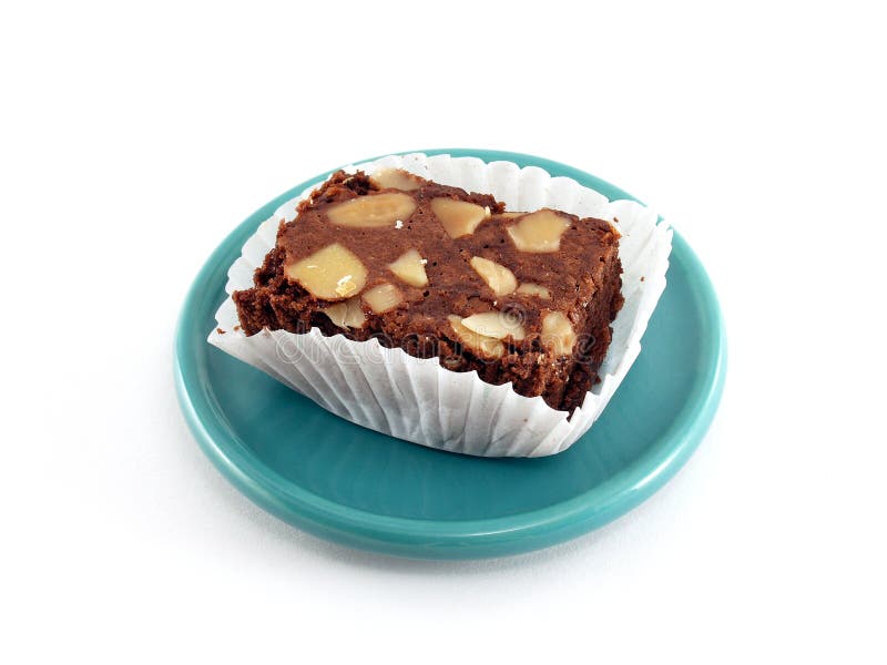 Brownie κέικ στο πράσινο πιατάκι στοκ φωτογραφία με δικαίωμα ελεύθερης χρήσης Brownie κέικ στο πράσινο πιατάκι στοκ φωτογραφία με δικαίωμα ελεύθερης χρήσης