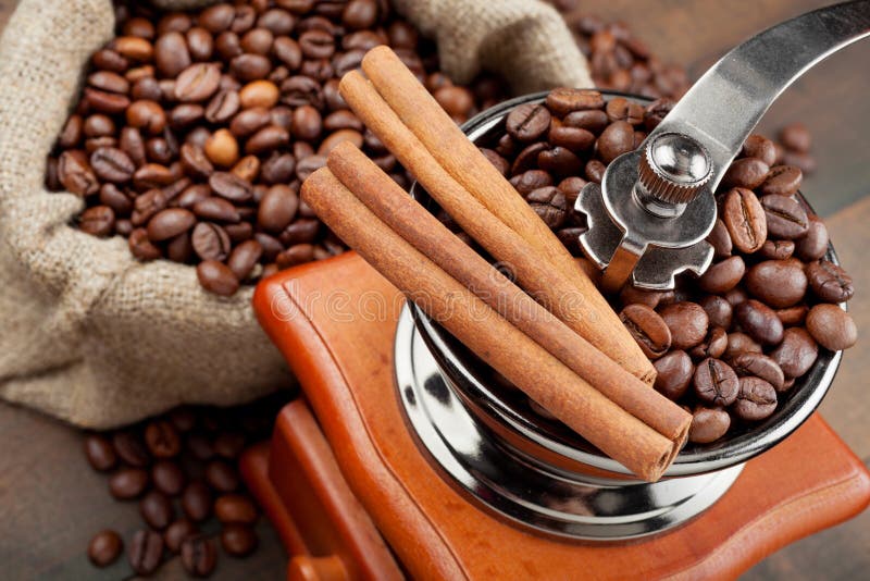 Coffee grinder and sack with coffee beans. Coffee grinder and sack with coffee beans