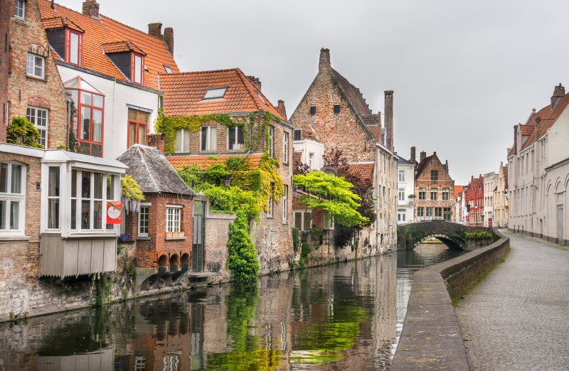 Beautiful unique buildings alongside a canal in Bruges, Belgium