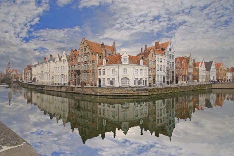 Old Houses reflected in a canal in Brugge, Belgium. Old Houses reflected in a canal in Brugge, Belgium