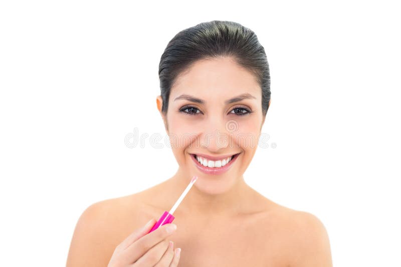Applying Lip Gloss and Smiling at Camera Stock Image Image