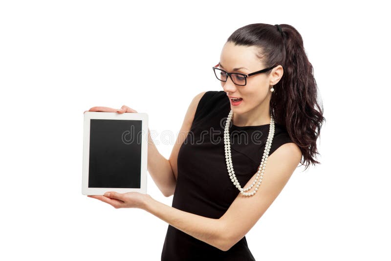 Brunette girl in black dress holding ipad