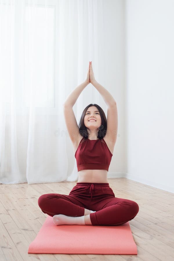 girl doing yoga on floor at home stock photography girl doing yoga on floor at home stock photography