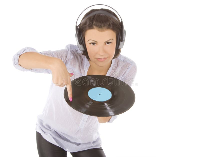 Brunette nos auscultadores com registro de vinil fotografia de stock Brunette nos auscultadores com registro de vinil fotografia de stock