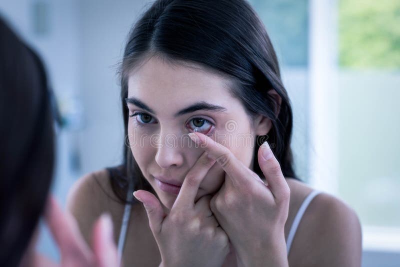 Inserting a Contact Lens in Female Eye Stock Image Image of eyelash