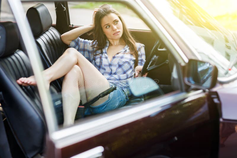 Brunette is Sitting in Open Car Stock Image - Image of driver, outdoors ...