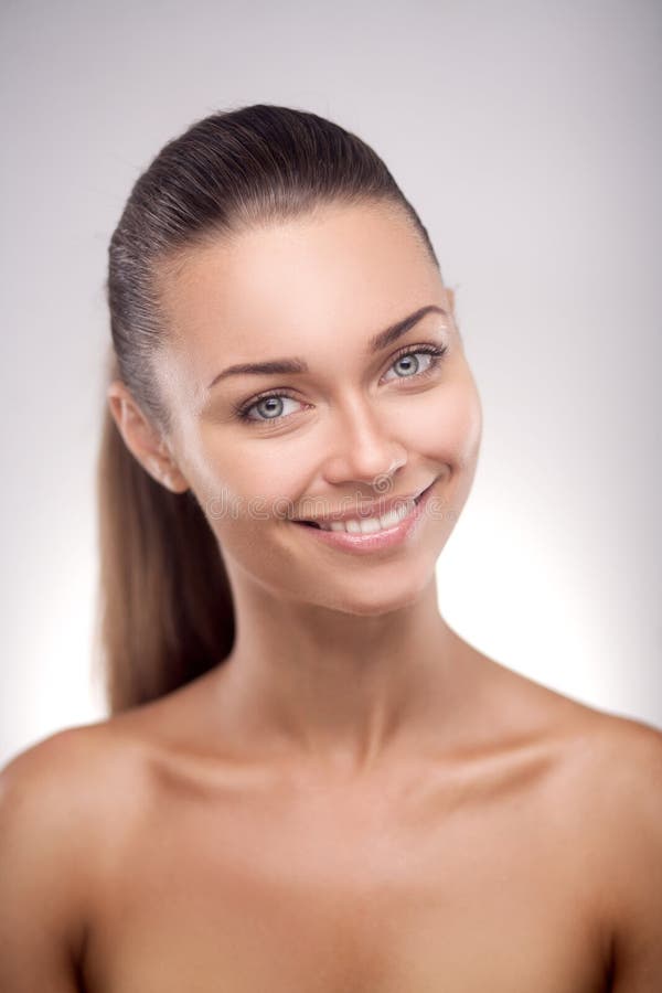 Poirtrait Of Attractive Young Woman Dancer Standing Near Ballet Barre 