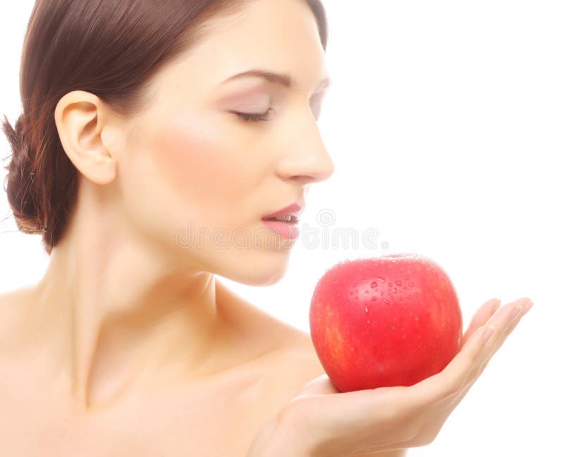 Brunette woman with red apple