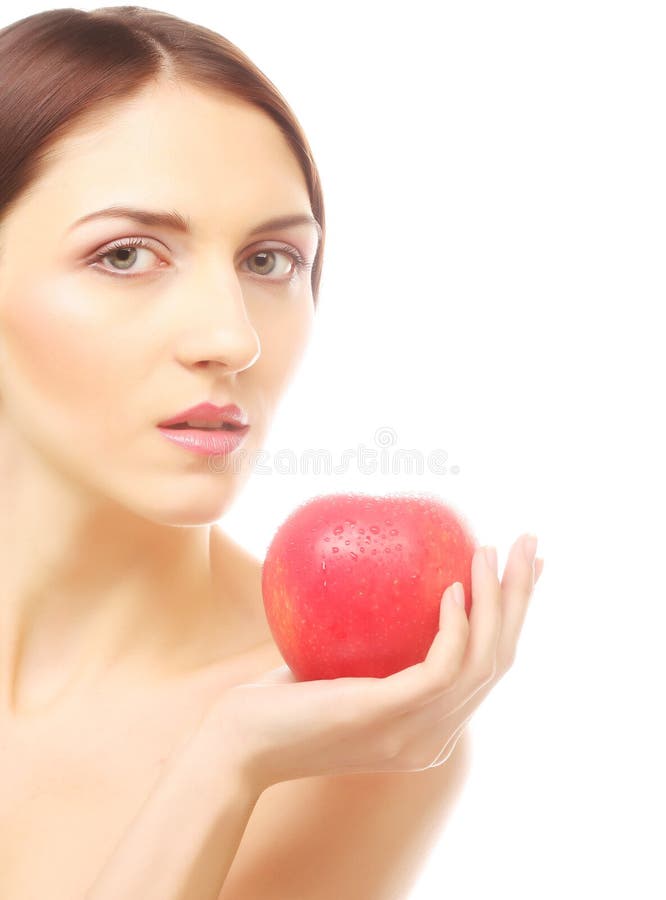 Brunette woman with red apple