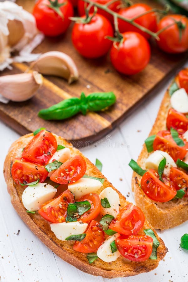 Bruschetta with Cherry Tomato and Mozzarella Stock Photo - Image of ...