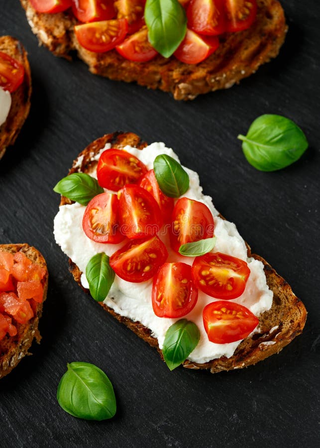 Bruschetta with Ricotta, Mozzarella Cheese, Basil, Cherry and Sliced