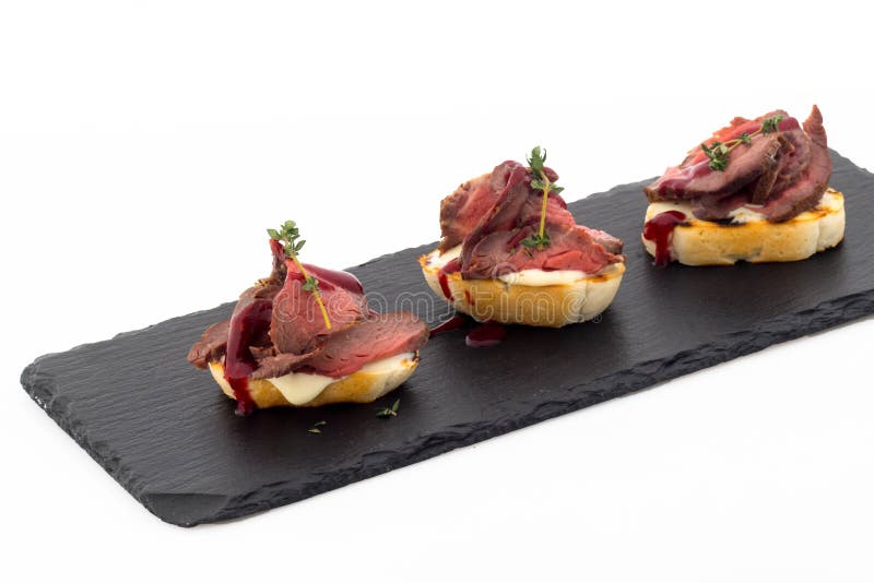 Bruschetta with roast beef stock photo. Image of meal 182171482