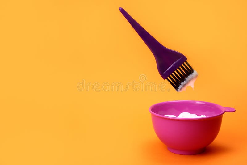 Brush Levitating Over a Plastic Bowl of Hair Dye Stock Image Image of
