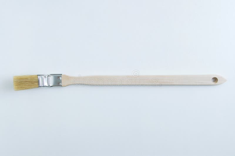 Brush for Painting Radiators with Wooden Handle on a White Background