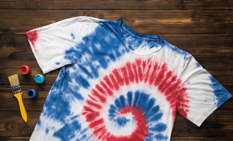 Tubes Of Paint For Clothes And Tshirt In Tie Dye Style On A White Table  Flat Lay Stock Photo - Download Image Now - iStock