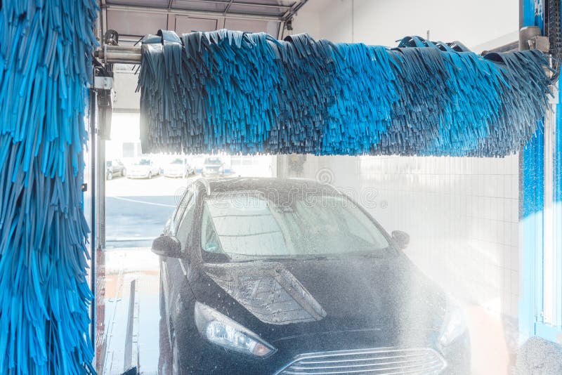 Brush Turning in Car Wash with Vehicle in it Stock Photo Image of