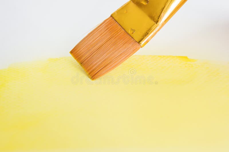 Brush with yellow paint stock photo. Image of paper, watercolor 50338874